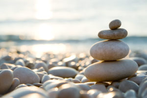 stones balanced to symbolize harmony